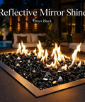 Onyx Black Fire Glass Rocks Half Inch High Luster Reflective Tempered Glass For Fire Pits And Fireplaces Indoors Or Outdoors Safe With Propane Or Natural Gas Burners 10 Pounds in a lit outdoor fire pit