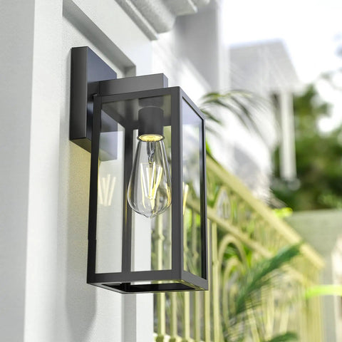 Durable Black Exterior Wall Lanterns With Hella Weatherproof Build For Backyards And Patios close-up of metal lantern with glass shade.