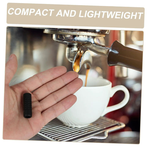 Person holding Steam Wand Guard And Heat Shield For Espresso Machines Easy Install Insulation Cover in front of espresso machine