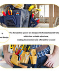 Front view of a worker wearing a blue tool belt with pockets holding pliers, screwdrivers, and tape measures.