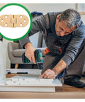 Man installing Rock Solid Adjustable Hinges For Doors And Folding Tables Featuring Heavy Duty Silent Movement using a drill.