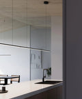 Contemporary LED Hanging Pendant Light Bar For Kitchen Island Or Dining Room With 20 Foot Adjustable Cord and Shiny Chrome Trim, overhead view in modern kitchen.