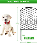 Arched Decorative Garden Fence Set Of 10 Panels With 24 Inch High Clearance, 13 Inch Wide Each, 10.8 Feet Long Total next to dog