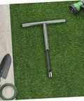 Durable Stainless Steel Soil Sampler Tool with T Handle Probe on grass for gardening, lawn care, and golf course maintenance