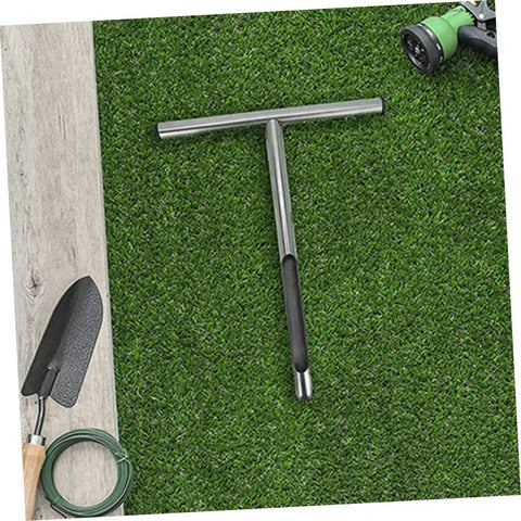 Durable Stainless Steel Soil Sampler Tool with T Handle Probe on grass for gardening, lawn care, and golf course maintenance