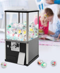 Kickass Heavy Duty Coin Vending Machine For Big Capsules with transparent display and colorful capsules, perfect for arcades.