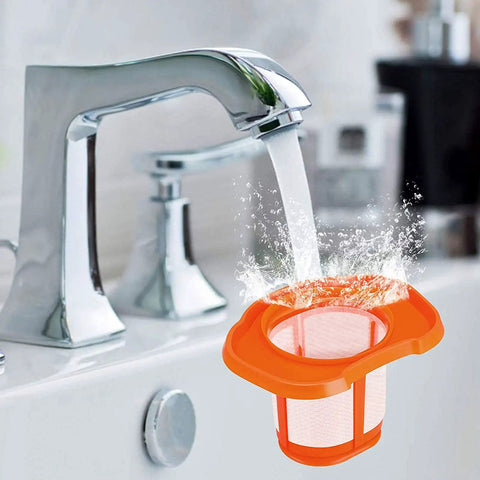 Six Pack HHVKF10 Vacuum Filter Replacements For HHVK Series being rinsed under a faucet