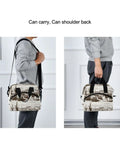 Person carrying Desert Cowboy Insulated Cooler Bag 10L Leakproof Lunch Box with handle and adjustable strap for shoulder carry