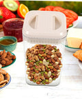 Keep Your Morning Grind Staying Dope And Fresh Inside This Space Saving Airtight Canister With A Tight Seal Lid, full of mixed nuts.