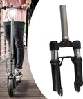 Front Suspension Fork For Electric Scooter With Shock Absorption Aluminum Alloy Construction Lightweight Easy Install Replacement Part Designed For Quick Install And Smooth Ride On Most Electric Scooters, shown separately and on scooter in motion.