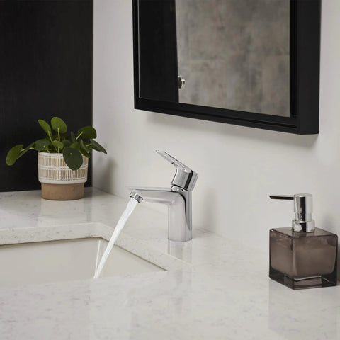 Bauloop Single Hole Bathroom Faucet With Single Handle S Size Chrome Finish 1.2 GPM Flow installed on a modern white vanity.