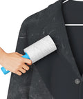 Hand using Extra Sticky Lint Roller Mega Value Set With 400 Sheets For Pet Hair Removal on black coat