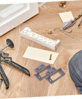 quiet heavy duty cabinet hinges lying on wooden floor with tools and materials for installation