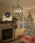 Six Light Black Modern Farmhouse Square Pendant Chandelier For Foyer Hallway Stairway Kitchen Island Dining Living Room 15.75 Inch Wide 22.4 Inch High With 35.4 Inch Chain Length hanging in a holiday-decorated living room with Christmas tree.