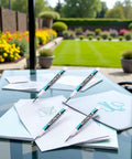 Top Shelf White Permanent Markers Quick Dry Oil Based Ink For Metal Glass Wood Built Tough Industrial And Craft Projects Smooth Writing Long Nozzle Nailed Every Job on a tabletop with sketches in a garden setting.