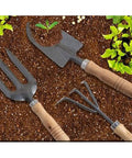 Three Kinds Of Gardening Tools Set Featuring Hooked Mattock Hand Shovel And Trident With Iron Heads And Wooden Handles