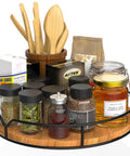 9 Inch Lazy Susan Turntable Organizer in Carbonized Black Pine Wood with condiments and kitchen essentials