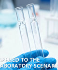 Five Piece Beefy Borosilicate Glass Tubes, 4 Inch Length, 2mm Wall Thickness, held in hand with lab equipment background