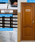 Various signage including desk nameplates, mailbox message plates, and a door sign reading 'BOSS' on a wooden door.