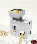Top Tier Automatic Powder Filling Machine With Precise 0.2g Accuracy And Fast 2 To 5 Second Dispensing Speed filling grains into a bowl.