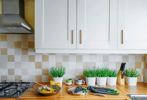 Modern kitchen with white cabinets featuring 10 Pack Solid 5 Inch Square Cabinet Handles Antique Brass Pulls For Kitchen Cabinets And Drawers.