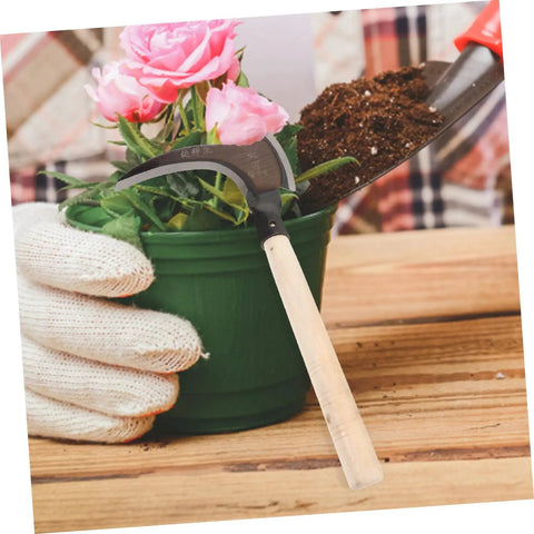 Long Handled Manganese Steel Multi Functional Sickle For Weeding And Harvesting With Ergonomic No Sweat Grip next to potted plant