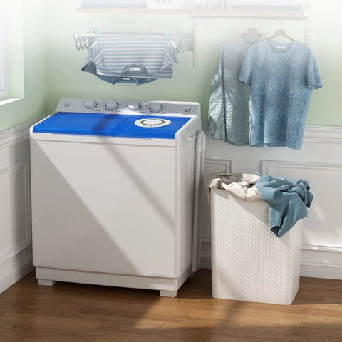 Dual Tub Portable Washing Machine With 30 Lb Wash Barrel And 18 Lb Spinner Drain Pump in a laundry room setting with clothes hang drying.