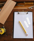 24 Pack Plastic Shelf Support Pegs For 0.79 Inch Thick Panels, two pegs on clipboard with pencil