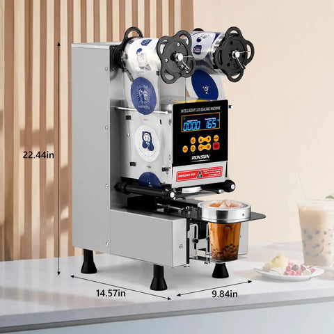 Fully Automatic Cup Sealing Machine With LCD Display For Bubble Tea And Coffee, No Fuss And Ultra Fast Sealing At 500 To 650 Cups Per Hour, Adjustable 88 To 95 Millimeter Cups, Electric Silver Finish on counter with cup