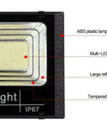 Close-up of JUDYSSY 800W Solar Floodlight Outdoor Spotlight IP66 Waterproof showing ABS plastic body, LED chip, and tempered glass.