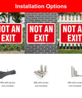 Two Pack Heavy Duty Aluminum Not Exit Signs Measuring Ten By Seven Inches displayed on various surfaces with installation options.