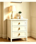 Top Shelf Brushed Brass Oval Cabinet Knobs And Zinc Alloy Single Hole Drawer Pulls Featuring Warm Olive Tones Four Pack on a dresser.