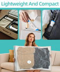DUORAN cordless electric vacuum pump with blue accents; portable pump for vacuum bags used on suitcase, backpack.