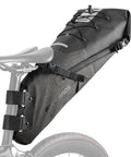 Adjustable 14L Waterproof Bikepacking Saddle Bag For Road And Mountain Bikes With Roll Top Closure attached to bike