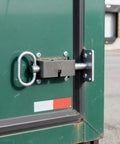 Heavy Duty 4 Pack Weld On Spring Gate Latches No Nonsense Outdoor Fence Hardware attached to a green gate.