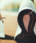Sole of a shoe showing five millimeter thick shoe rubber sheet with grippy non slip diamond pattern replacement soles installed