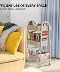 Three Tier Rolling Utility Cart With Lockable Wheels And Handy Metal Handle, Metal Storage Organizer On Wheels With Mesh Baskets For Kitchen, Living Room, Office Or Garage Beige Finish next to a beige sofa.