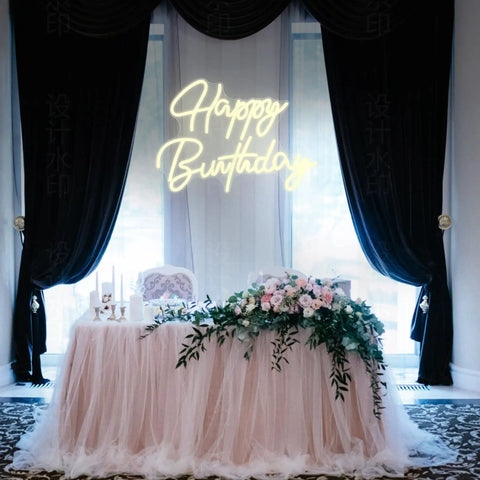 Smile Face Neon Sign Birthday Light 13 By 13 Inches Portable USB Powered Warm White Glow For Parties Take Anywhere Easy To Install With 2 Meter USB Cable Photo Backdrop And Party Ready Decor For Events above a party table with flower arrangement