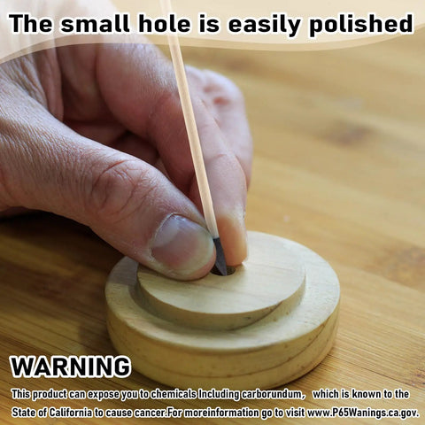 Hand using Fine Sanding Sticks For Models And Wood Five Point Four Inch 280 Grit 100 Pack to polish a wooden object