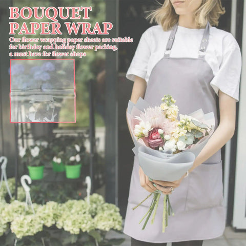 Florist holding bouquet wrapped in Red Flower Wrapping Paper For Bouquets 20 Sheets BOPP Flower Bouquet Packaging