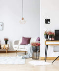 Living room with Smart Wifi Thermostat With Alexa And HomeKit Geofencing Capable Works With Google Assistant Cloud Control on wall