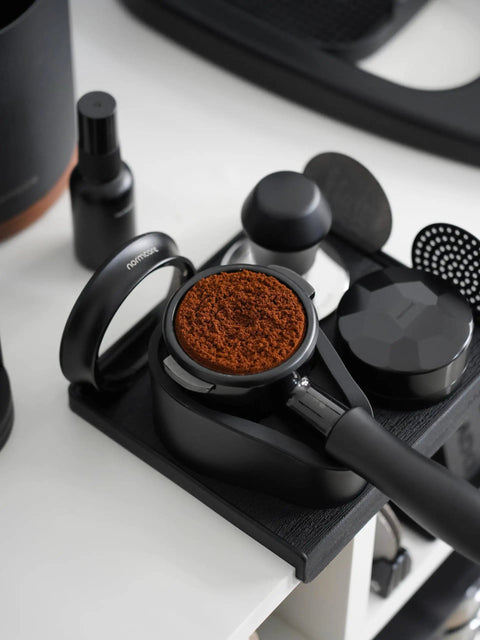 Top Shelf 58mm Espresso WDT Tool Featuring 16 Concentric Needles And Rock Solid Magnetic Base For Hella Even Puck Distribution Adjustable Depth Coffee Needle Stirrer Totally Nailing Shots Daily with coffee grounds ready for use.