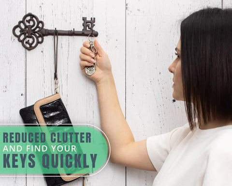 Brown Cast Iron Skeleton Key Wall Hook With Three Heavy Duty Coat Holders For Classic Farmhouse Vibes And Simple Down Home Entryway Organization Built Rock Solid For Everyday Hanging, showing keys and bag being hung.