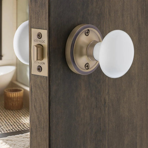 Classic Rosette White Porcelain Round Door Knob That Brings Old School Charm To Your Doors, Durable Porcelain Build, Timeless Vintage Vibe, And Ready In Multiple Finishes For Interior Entry Or Closet Doors