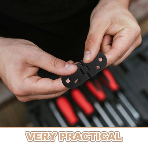 Hands holding 8 Piece Black Zinc Alloy Folding Table Flip Top Hinges With 180 Degree Round Edge Design, toolbox in background