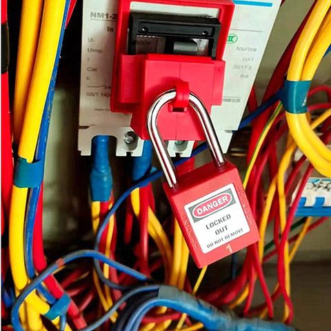 Lockout Tagout Kit With Ten Padlocks And Tags Key Alike One Through Ten OSHA Safety Locks securing an electrical panel
