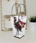 Plastic Flower Bouquet Bag With Handle For Floral Arrangements And Weddings, Rose Wrapping Bag, displayed with red roses inside.