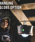 Rechargeable Emergency Camping Lantern With 2500 Lumens Beast Mode Brightness hanging from wooden beam outdoors
