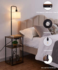Floor Lamp With Table And USB C Charging Station Rustic End Table Lamp With Shelves beside bed in bedroom setup