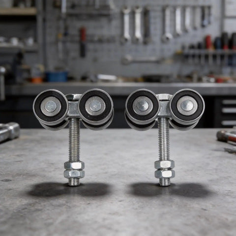 Close-up of Heavy Duty 4 Wheel Trolley Assembly Rollers With Rust Resistant Galvanized Body High Carbon Steel Core on workbench.